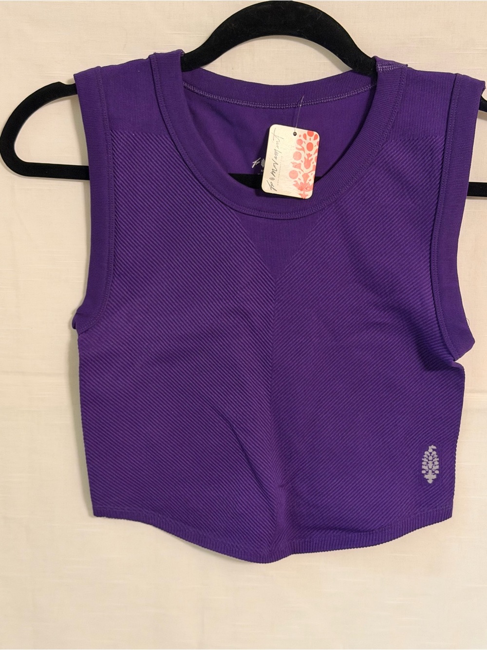 Free Throw Muscle Tank
Size: M/L
Purple